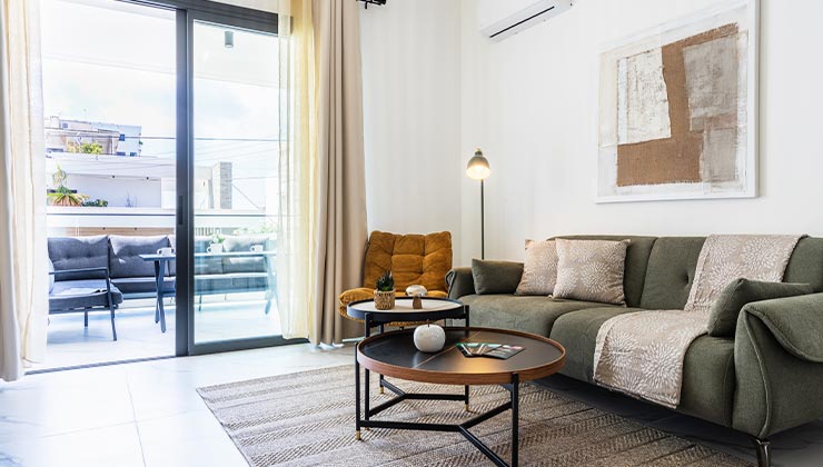 abraj 101 apartment modern living room with furniture and balcony.